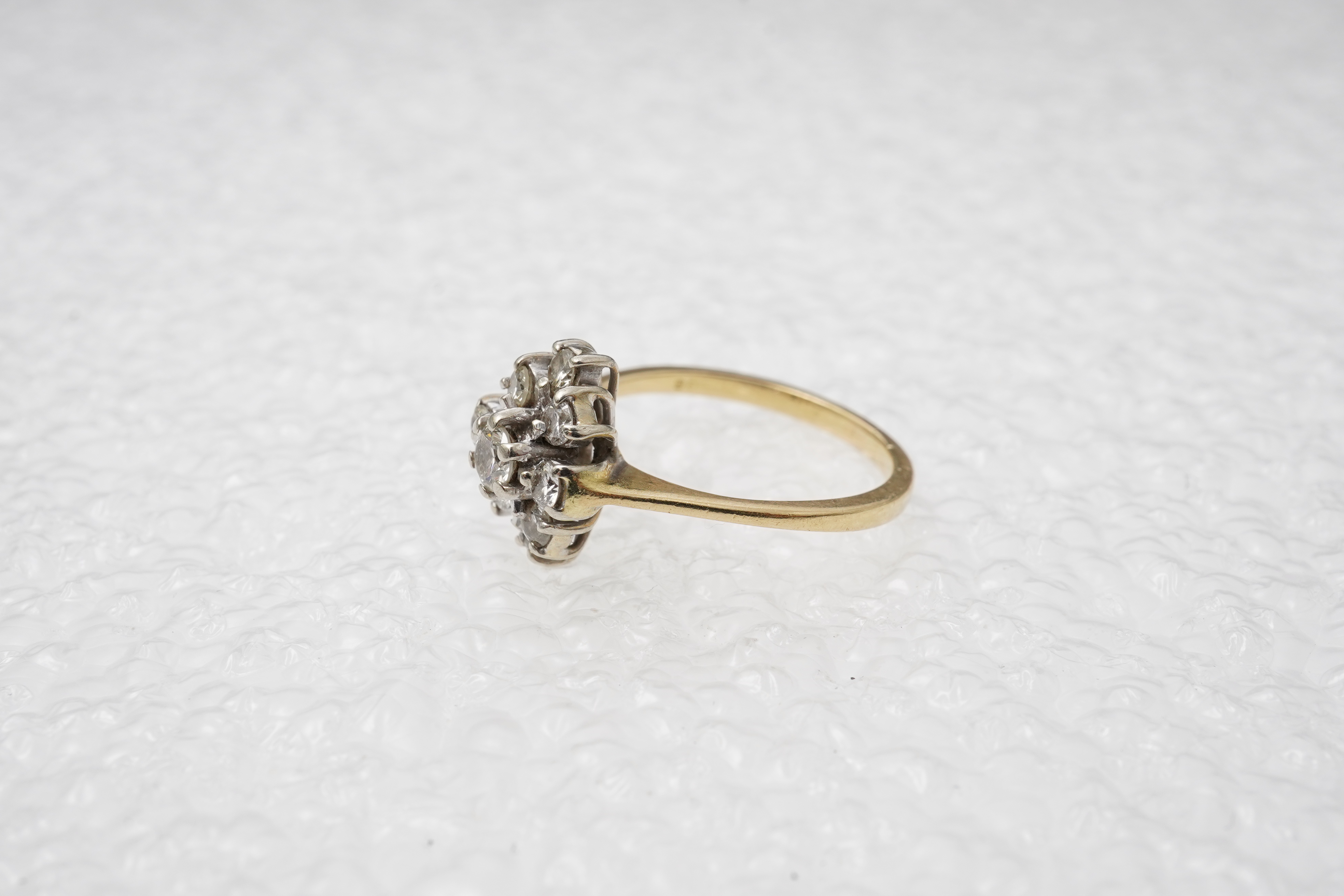 A diamond cluster ring